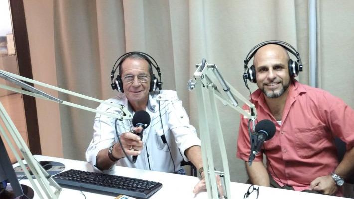 The artist of Maxima Douglas Peérez Castro together with the announcer Ángel Ferrera, in Habana Radio. The artist of Maxima Douglas Perez Castro together with the announcer Ángel Ferrera, in Habana Radio.